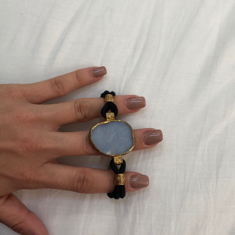 Black bracelet blue stone